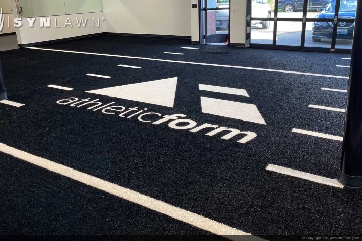 SYNLawn Oregon prefab turf logos for athletic weight room applications